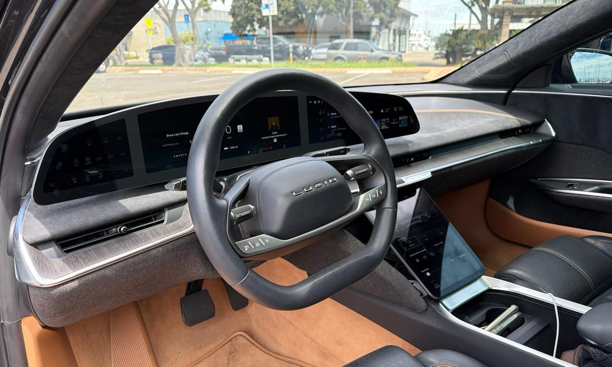 Lucid Air Grand Touring cockpit with tan leather interior and Glass Cockpit display